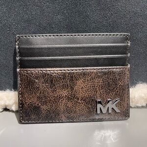 MICHAEL KORS Cyrus Burnished Tall Card Case
Chocolate Brown 
NWT